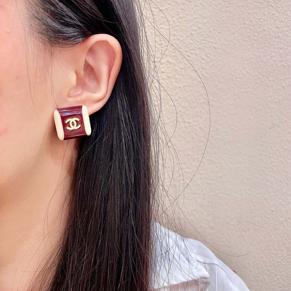 Martin Graham stud earrings in polished metal-tone – detail view