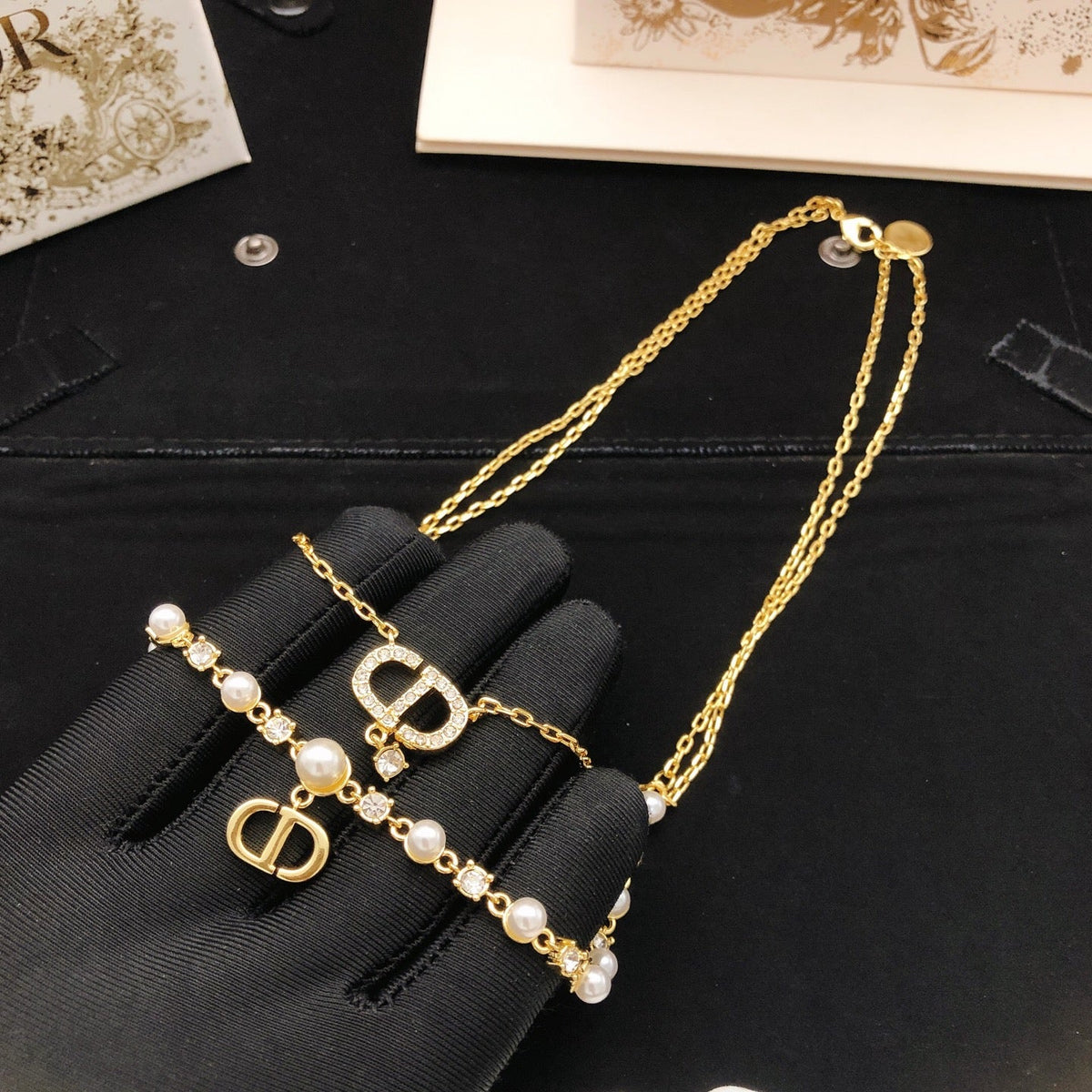 Martin Graham pendant necklace in polished metal-tone – detail view