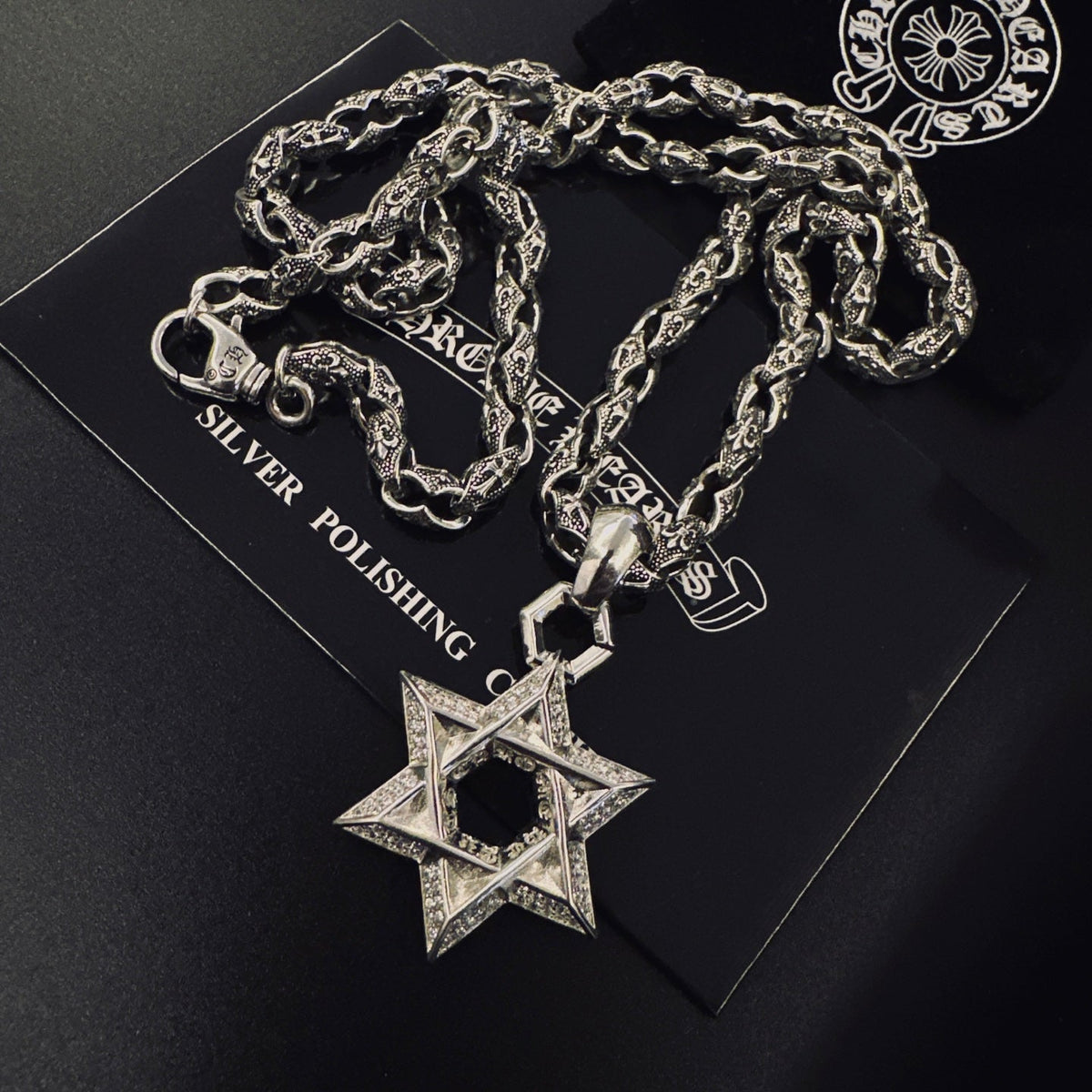 Martin Graham pendant necklace in polished metal-tone – detail view
