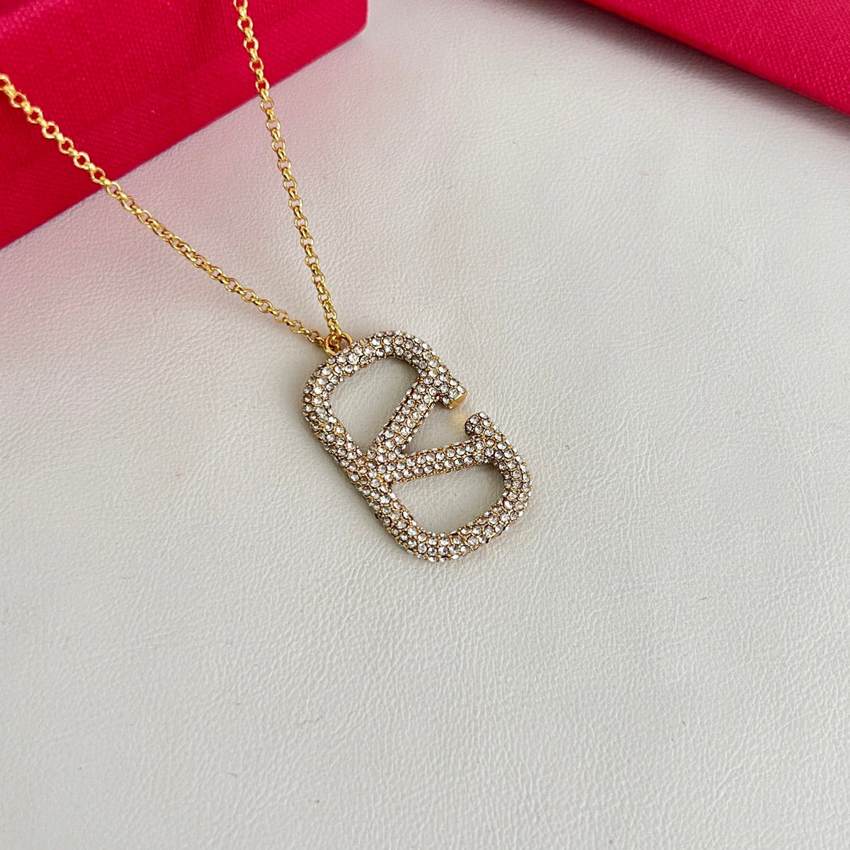 Martin Graham pendant necklace in polished metal-tone – detail view