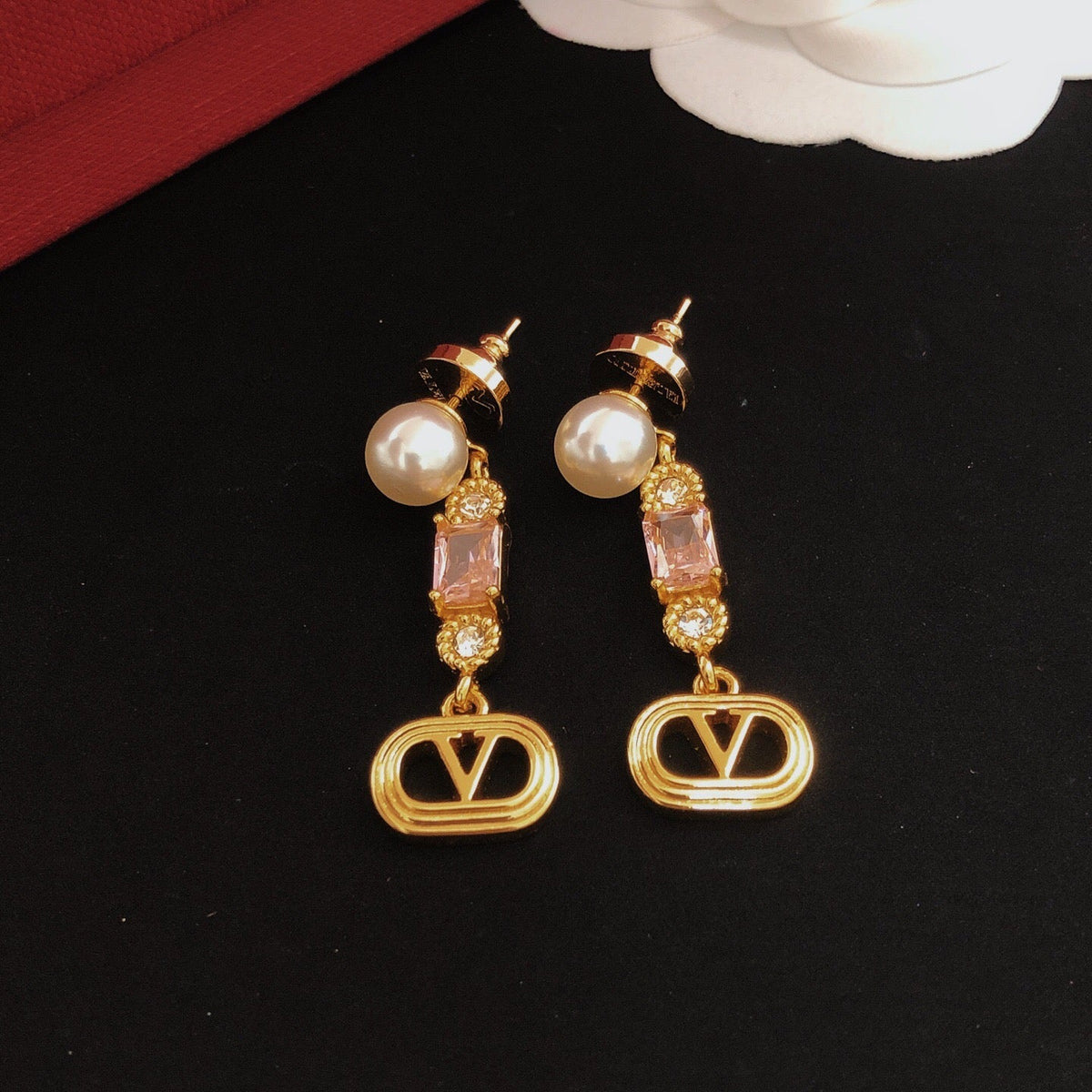 Martin Graham stud earrings in polished metal-tone – detail view