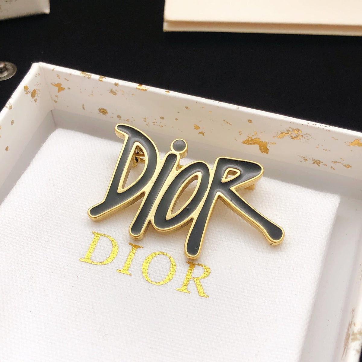 Martin Graham brooch in polished metal-tone – detail view