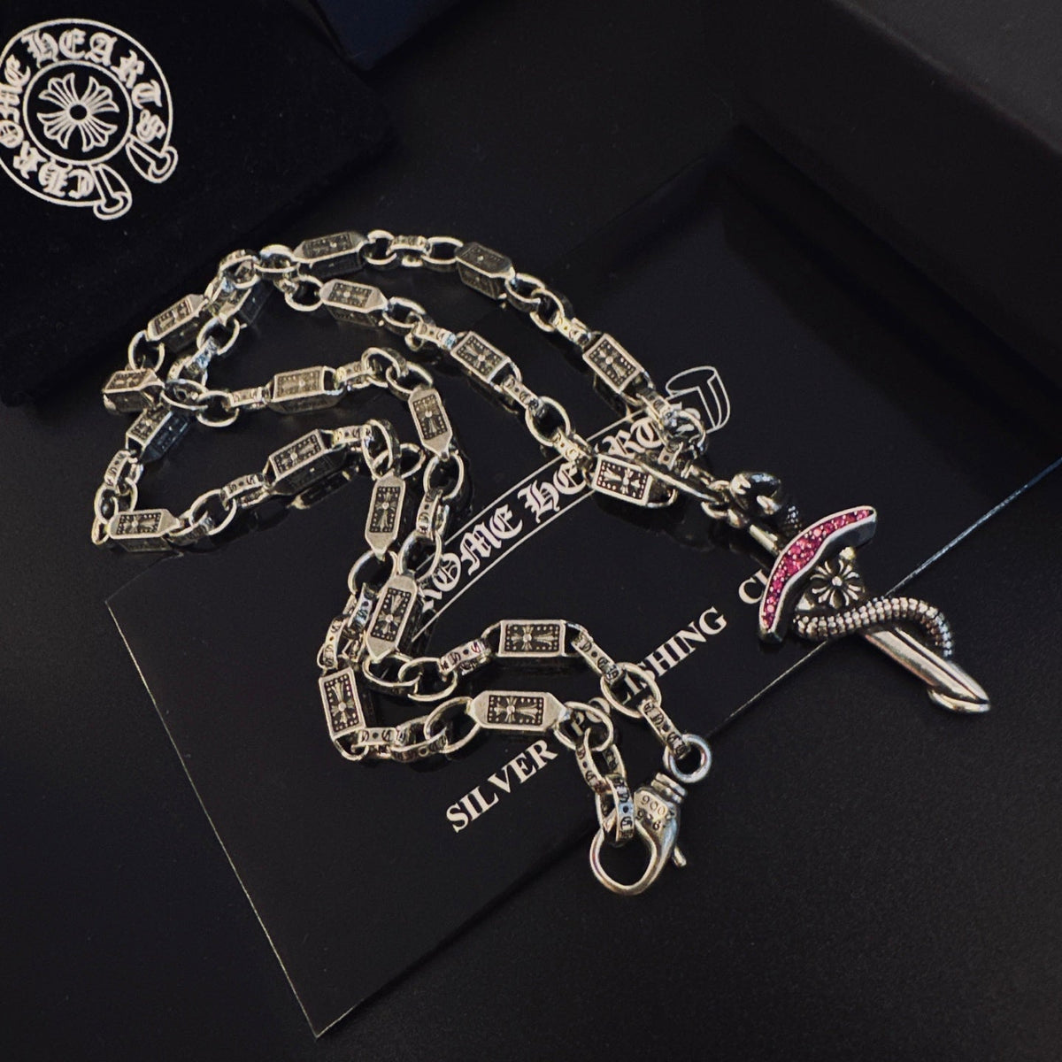 Martin Graham pendant necklace in polished metal-tone – detail view