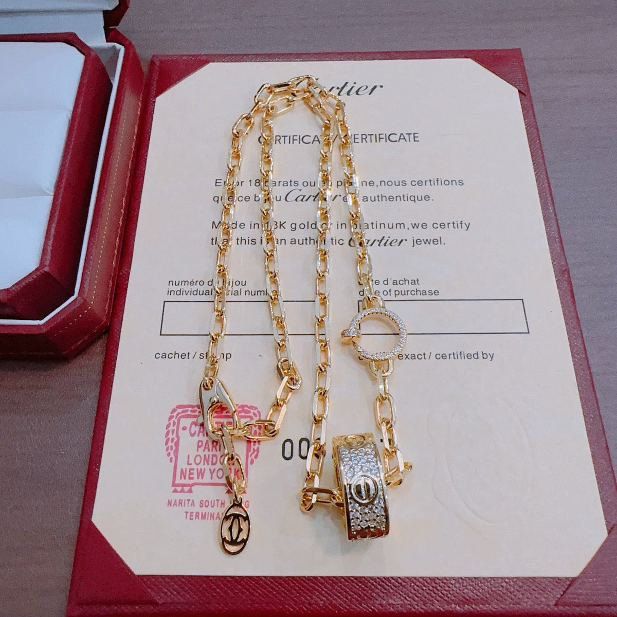 Martin Graham pendant necklace in polished metal-tone – detail view