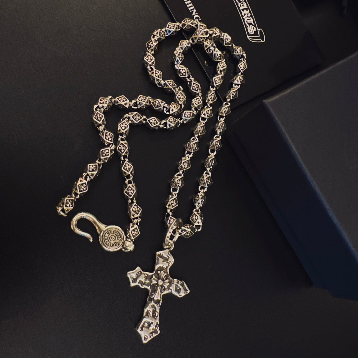 Martin Graham pendant necklace in polished metal-tone – detail view