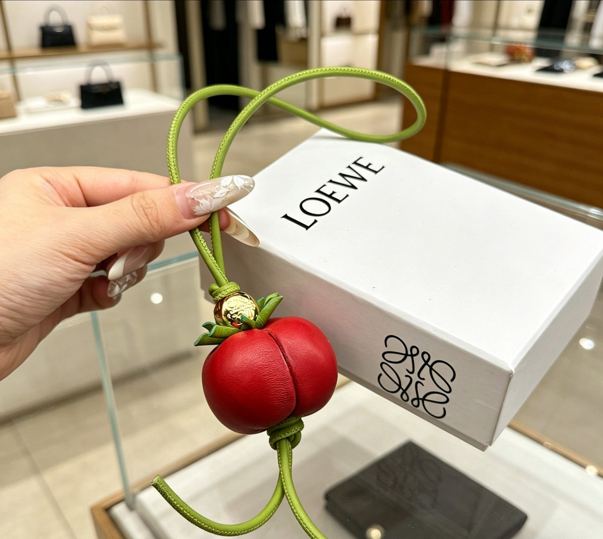 Martin Graham bag charm in polished metal-tone – detail view