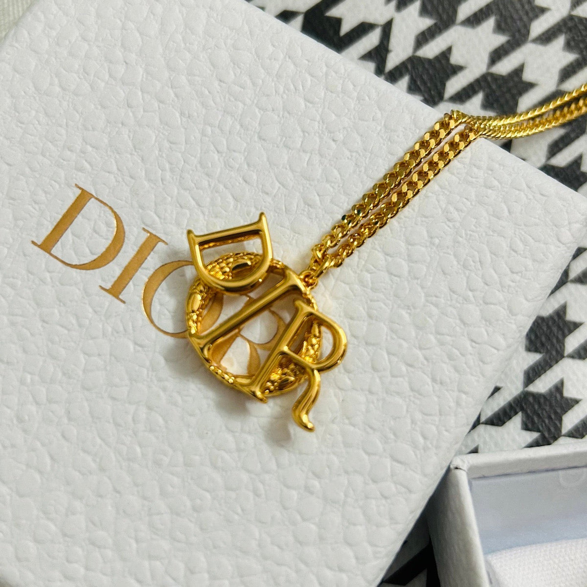 Martin Graham pendant necklace in polished metal-tone – detail view