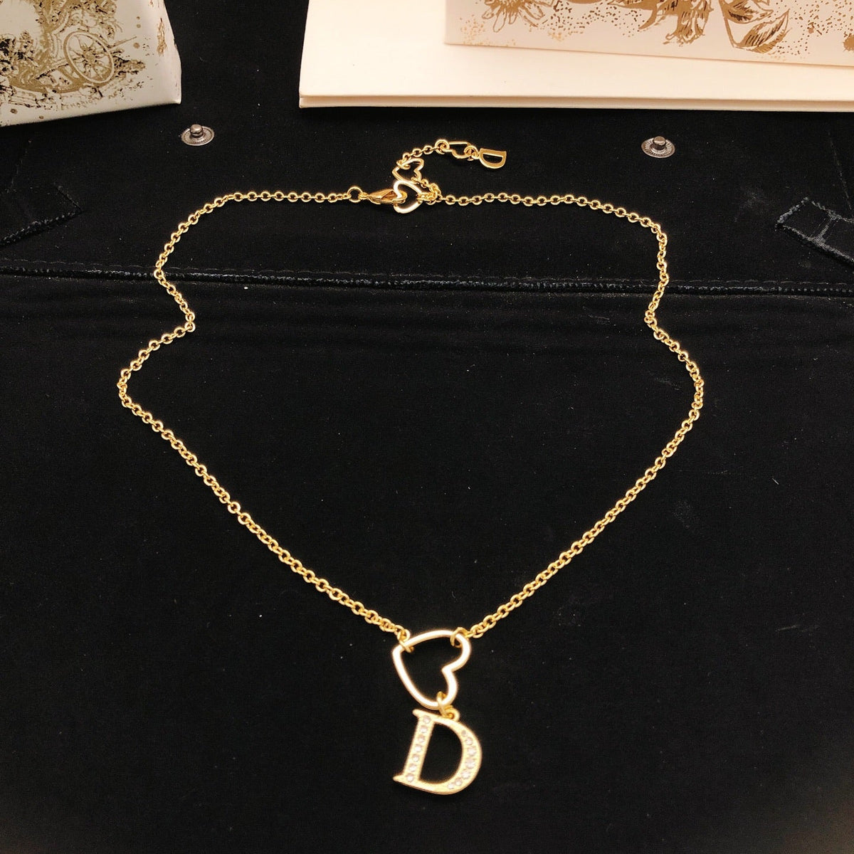 Martin Graham pendant necklace in polished metal-tone – detail view