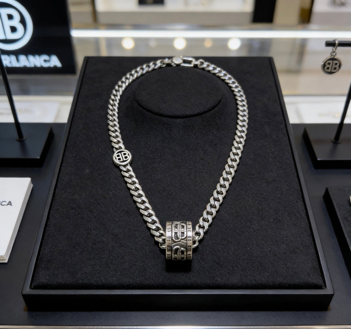 Martin Graham pendant necklace in polished metal-tone – detail view