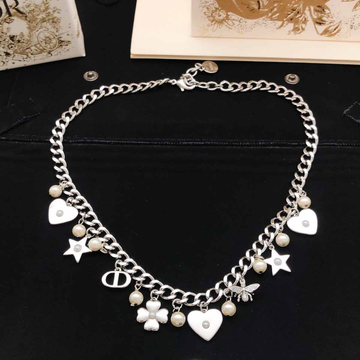 Martin Graham pendant necklace in polished metal-tone – detail view