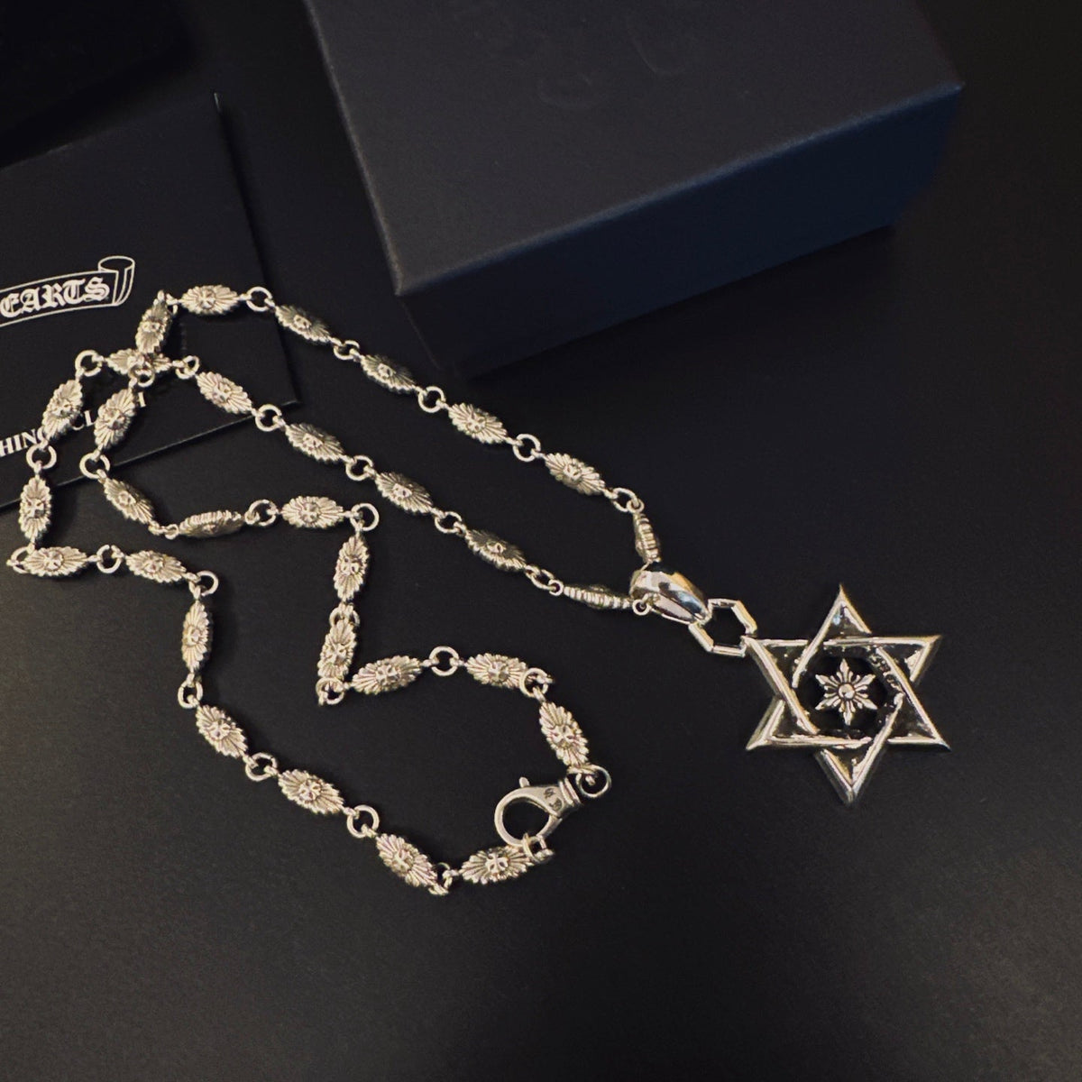 Martin Graham pendant necklace in polished metal-tone – detail view