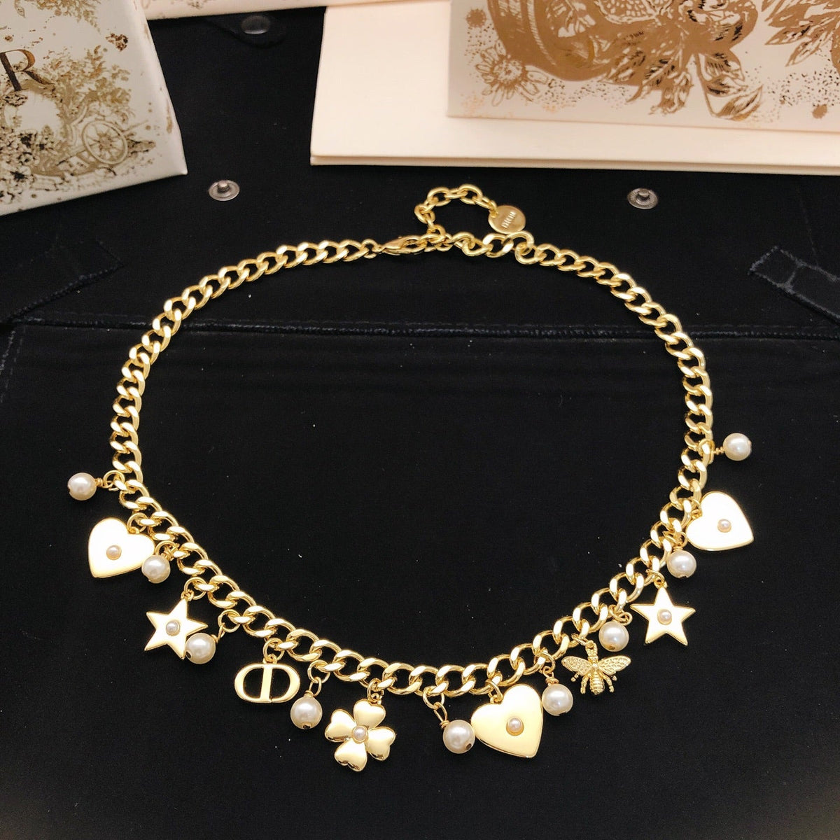 Martin Graham pendant necklace in polished metal-tone – detail view