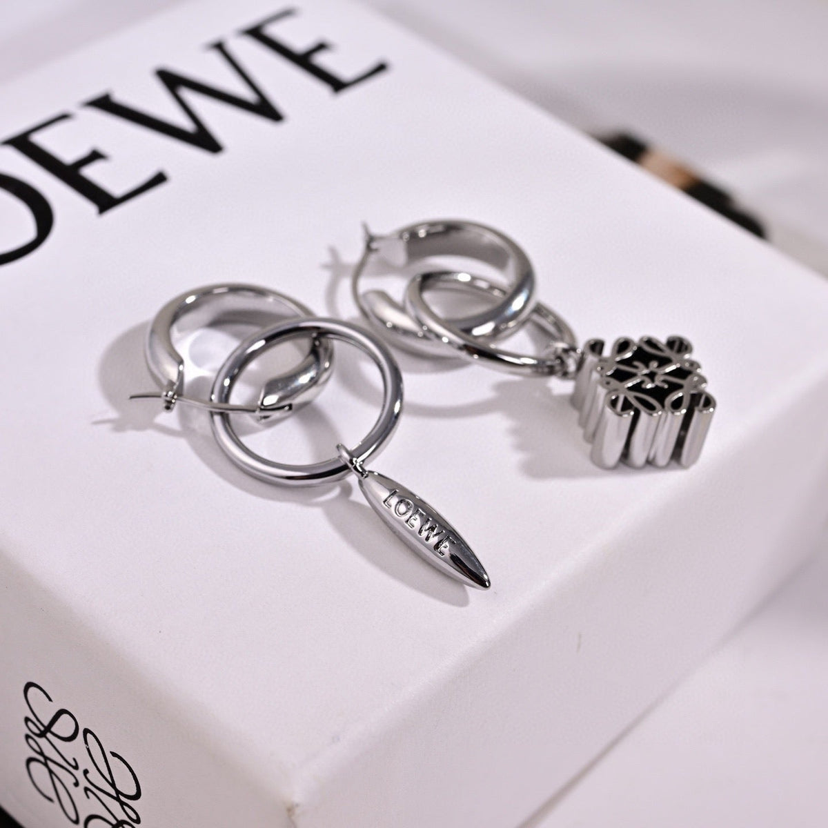 Martin Graham earrings in polished metal-tone – detail view