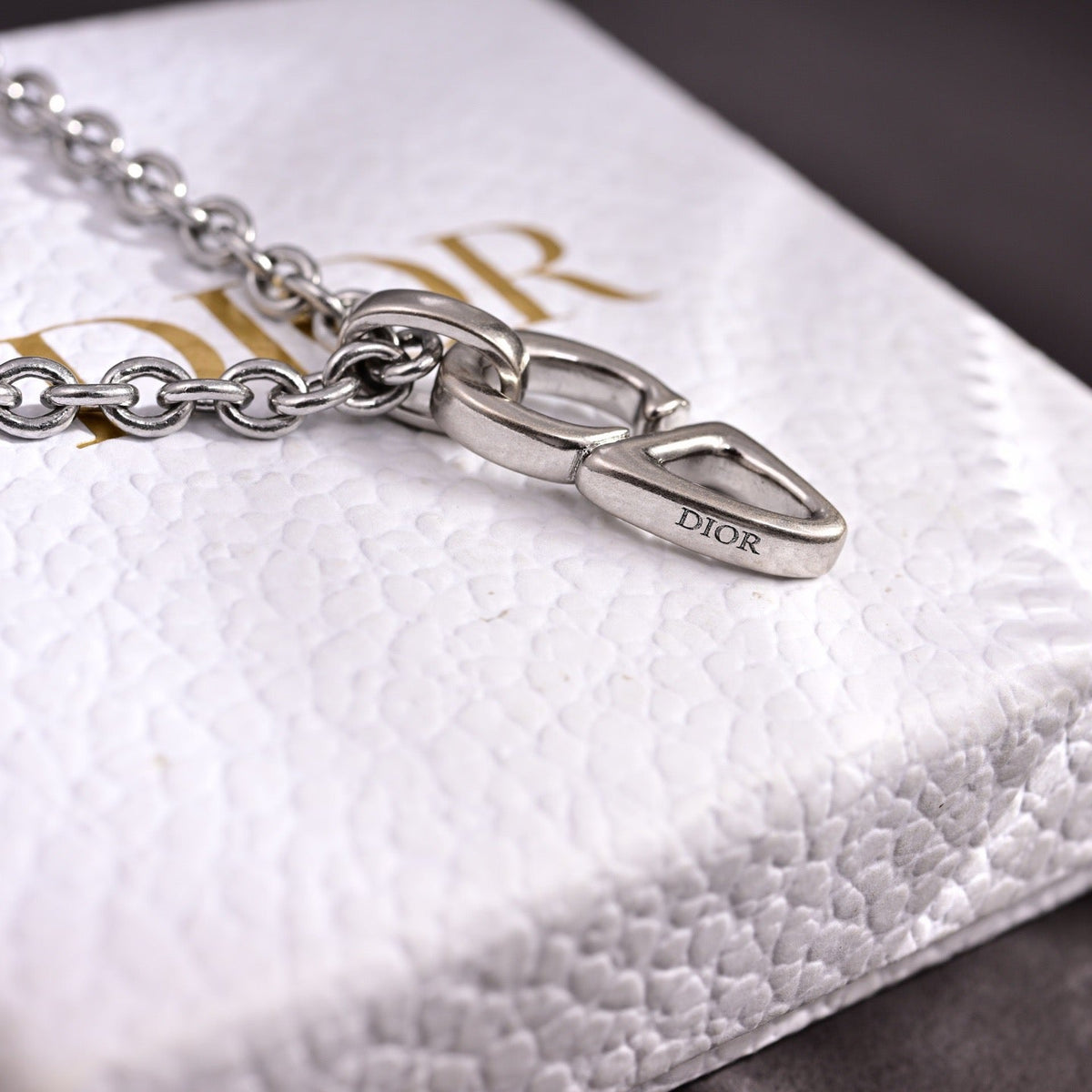 Martin Graham pendant necklace in polished metal-tone – detail view