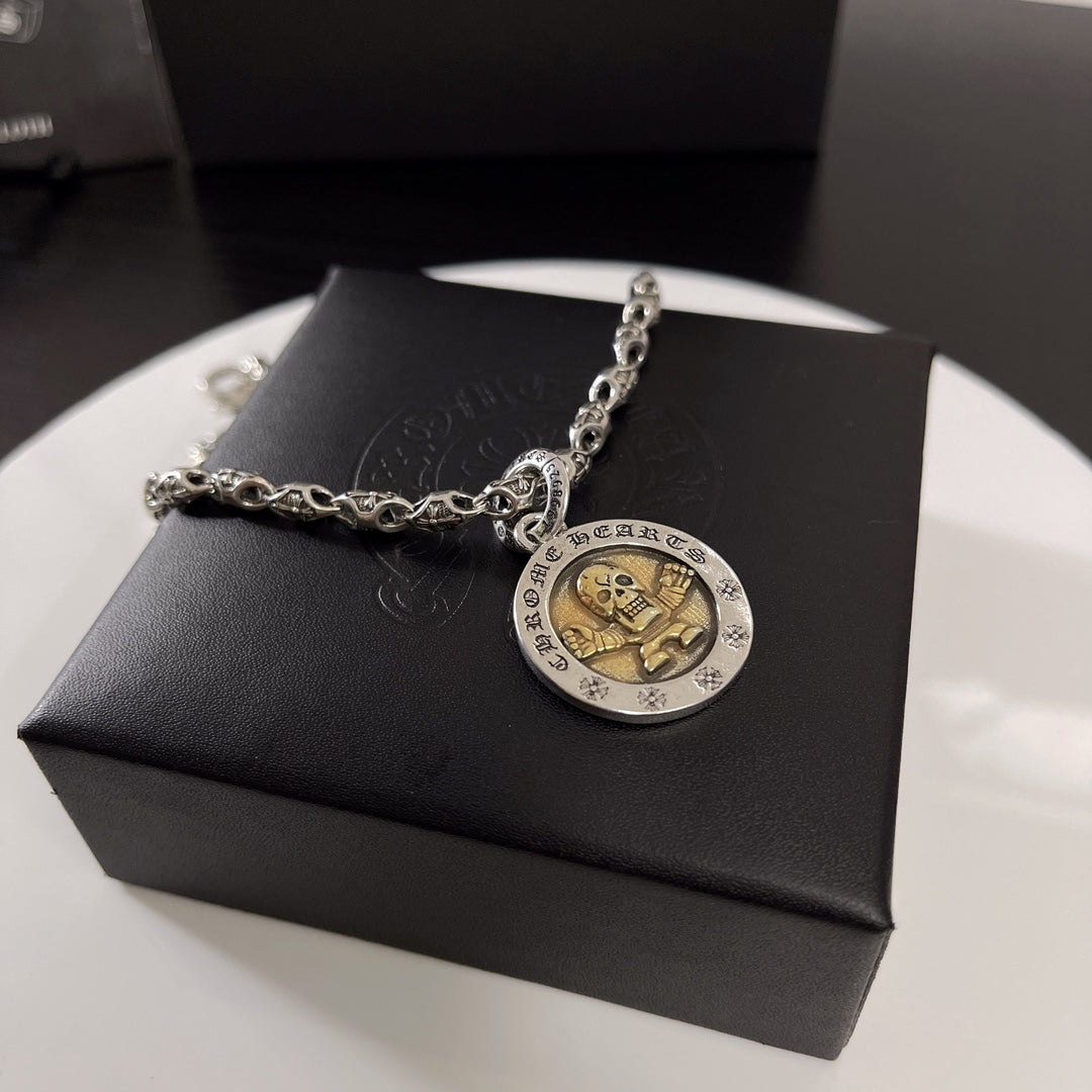 Martin Graham pendant necklace in polished metal-tone – detail view