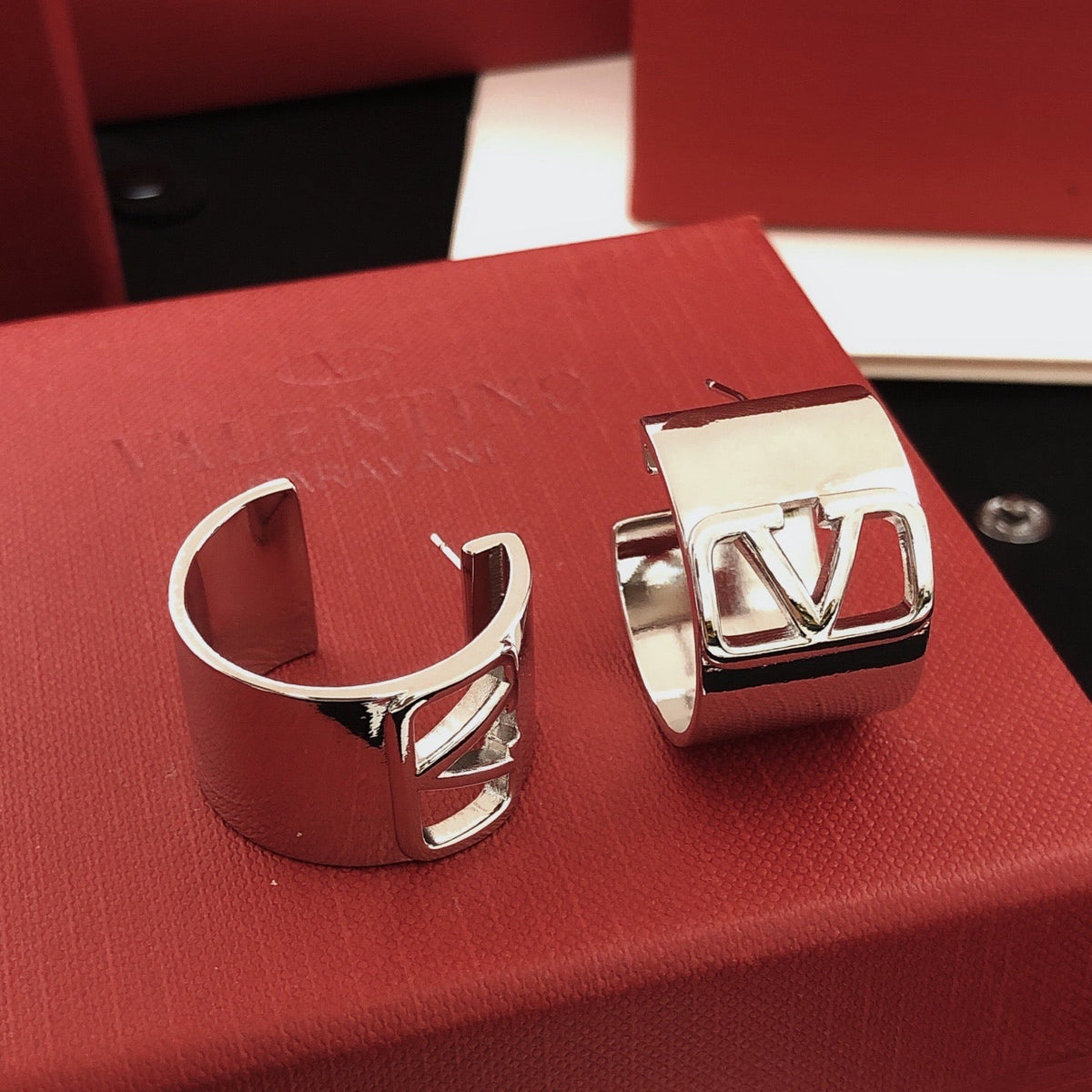 Martin Graham drop earrings in polished metal-tone – detail view