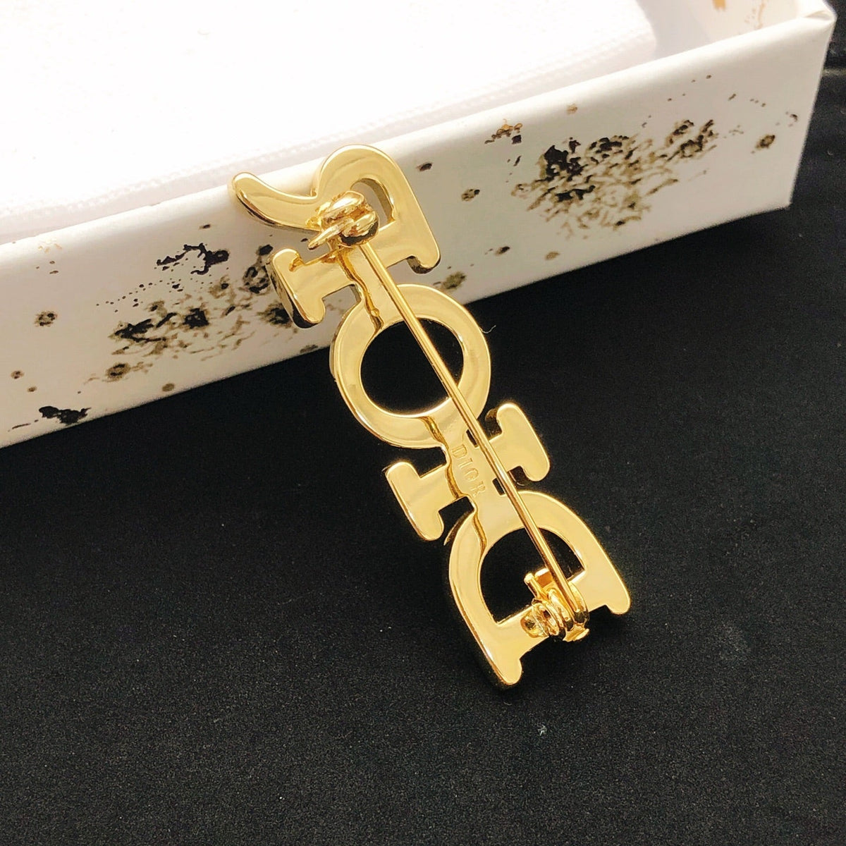 Martin Graham brooch in polished metal-tone – detail view