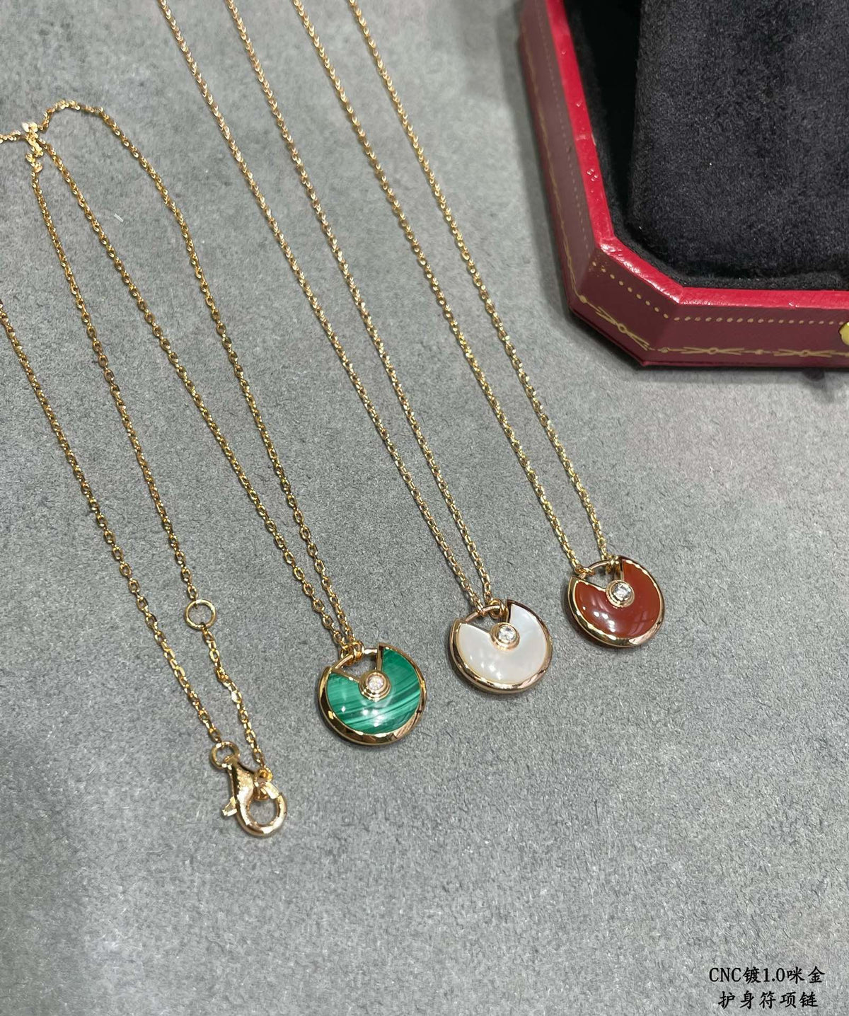 Martin Graham pendant necklace in polished metal-tone – detail view