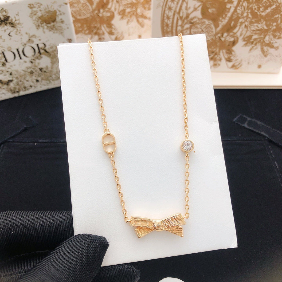 Martin Graham pendant necklace in polished metal-tone – detail view
