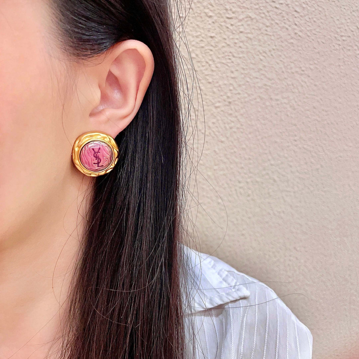 Martin Graham stud earrings in polished metal-tone – detail view