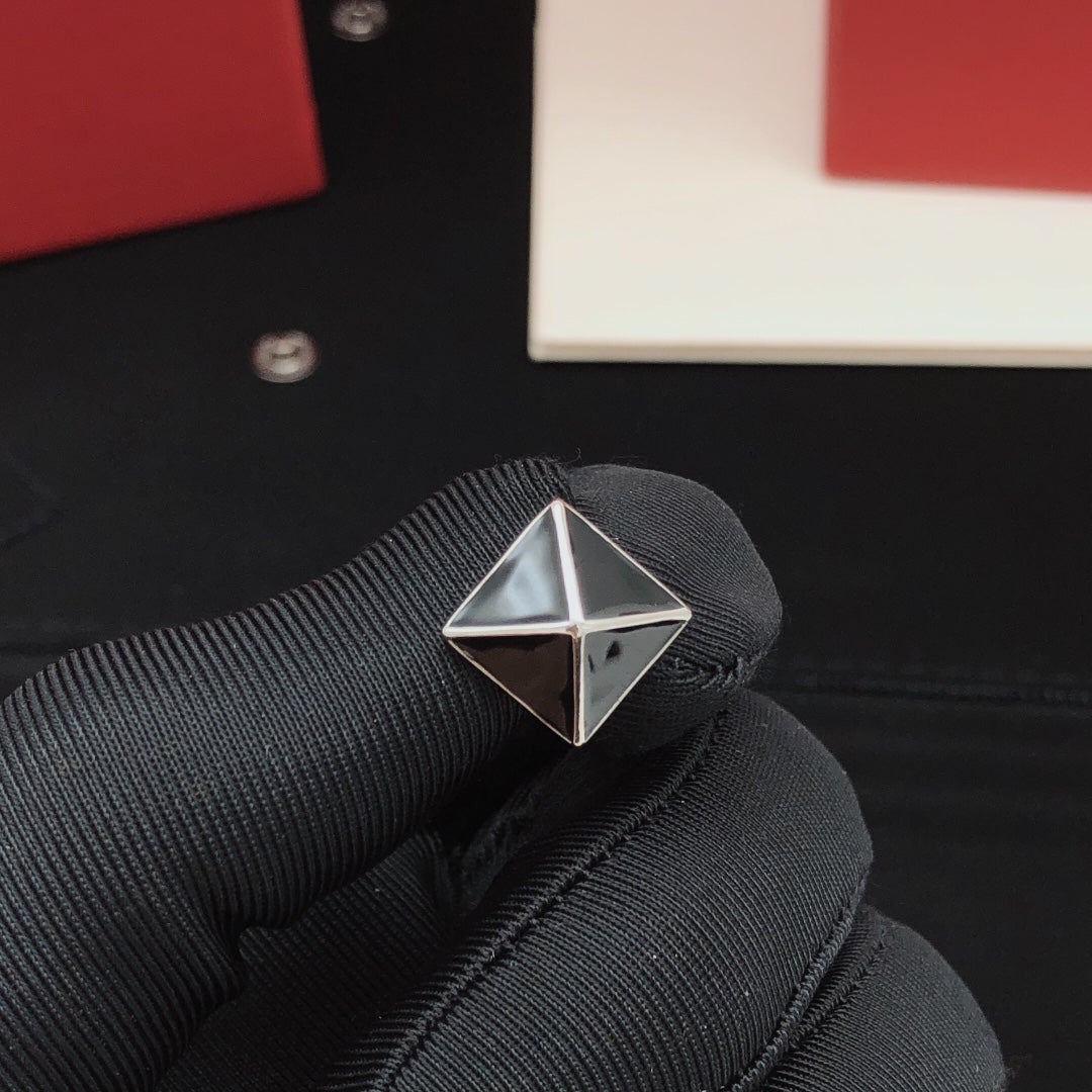 Martin Graham stud earrings in polished metal-tone – detail view