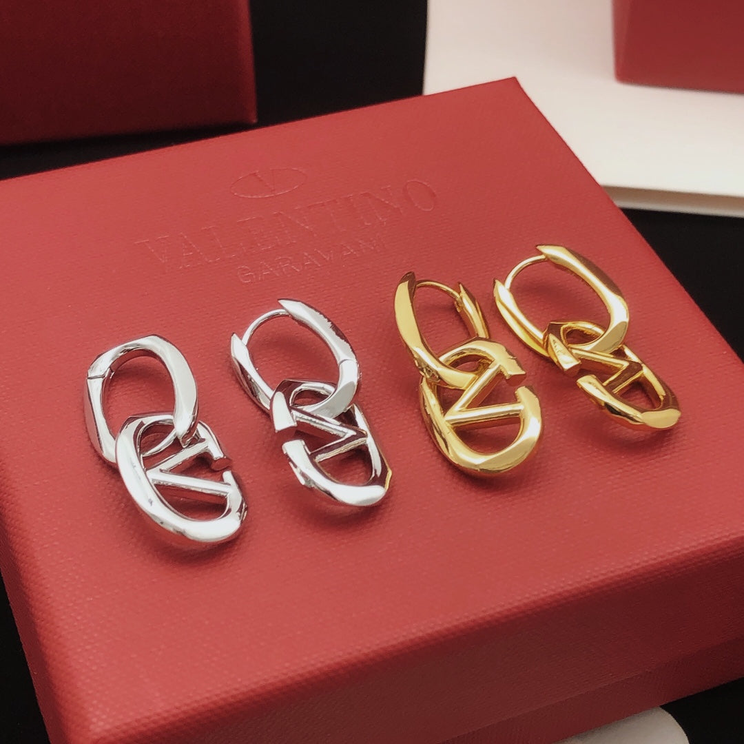 Martin Graham drop earrings in polished metal-tone – detail view