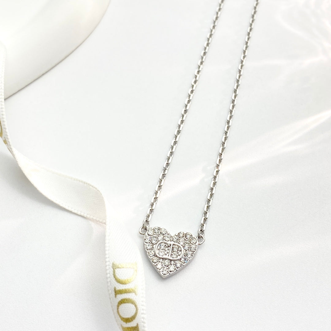 Martin Graham pendant necklace in polished metal-tone – detail view