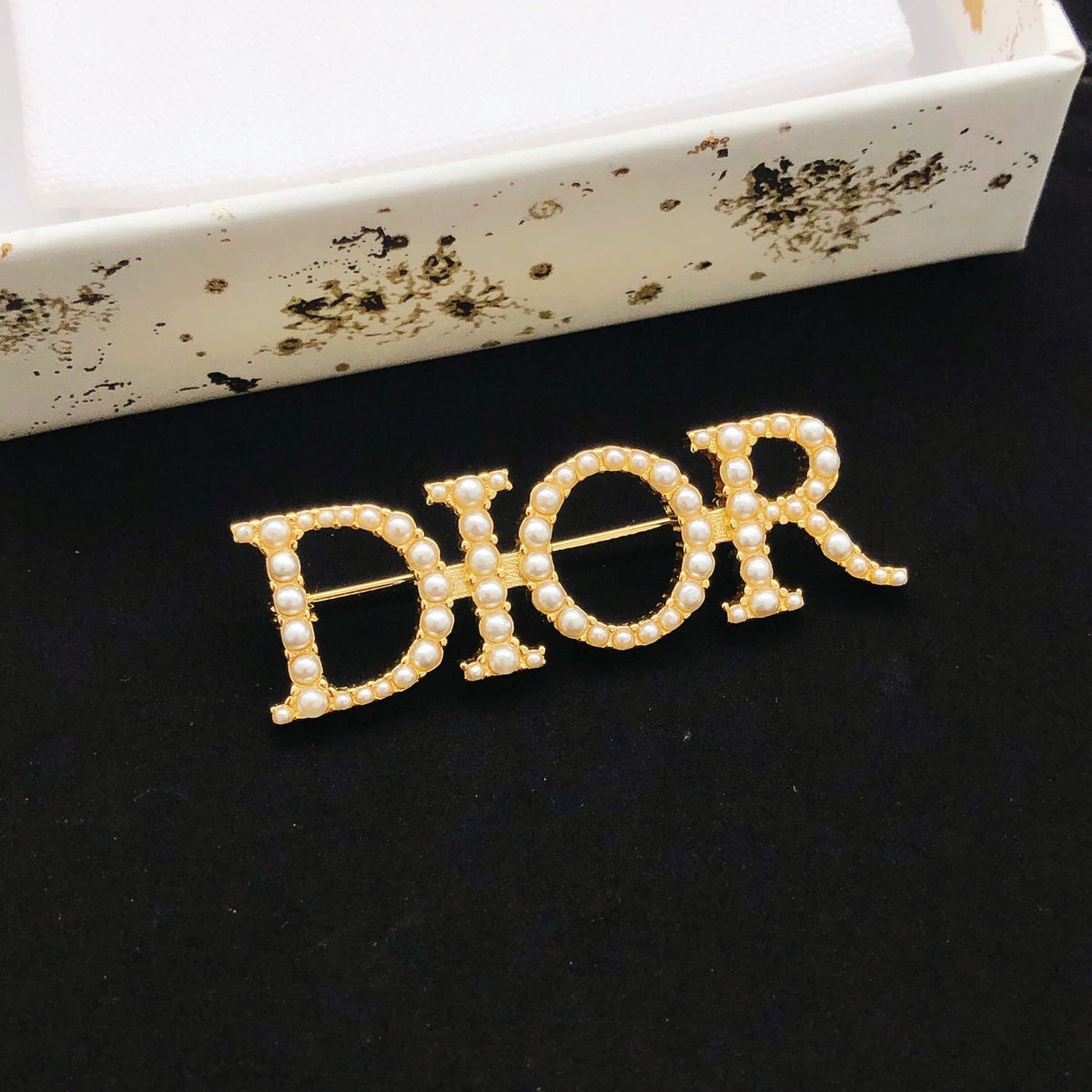 Martin Graham brooch in polished metal-tone – detail view