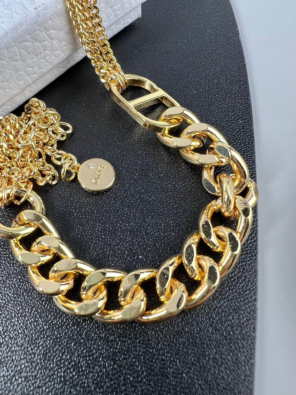 Martin Graham pendant necklace in polished metal-tone – detail view