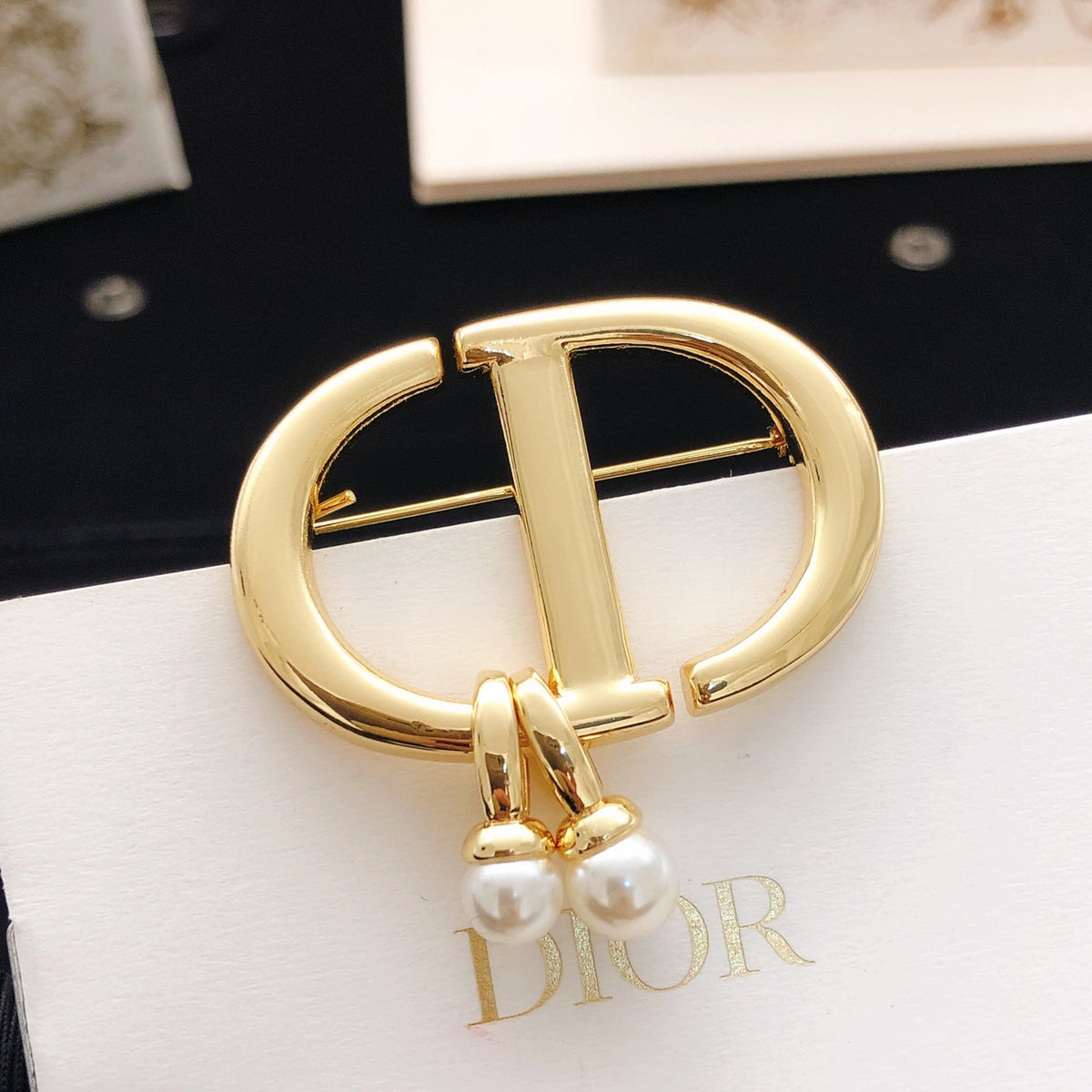 Martin Graham brooch in polished metal-tone – detail view