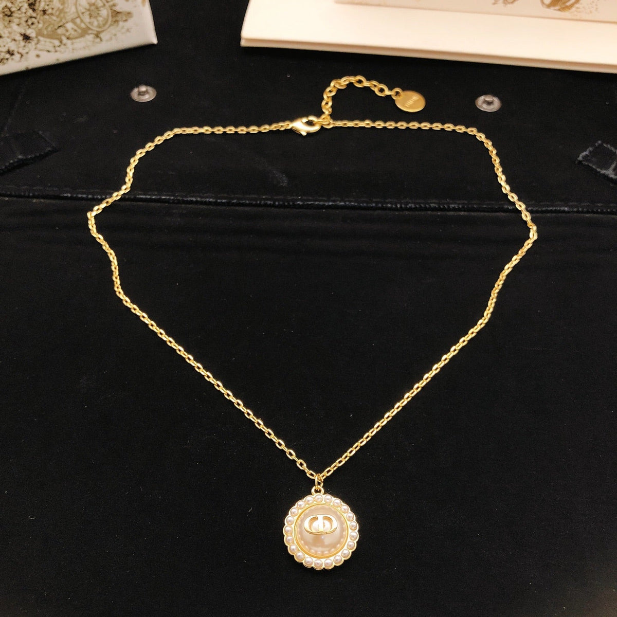 Martin Graham pendant necklace in polished metal-tone – detail view