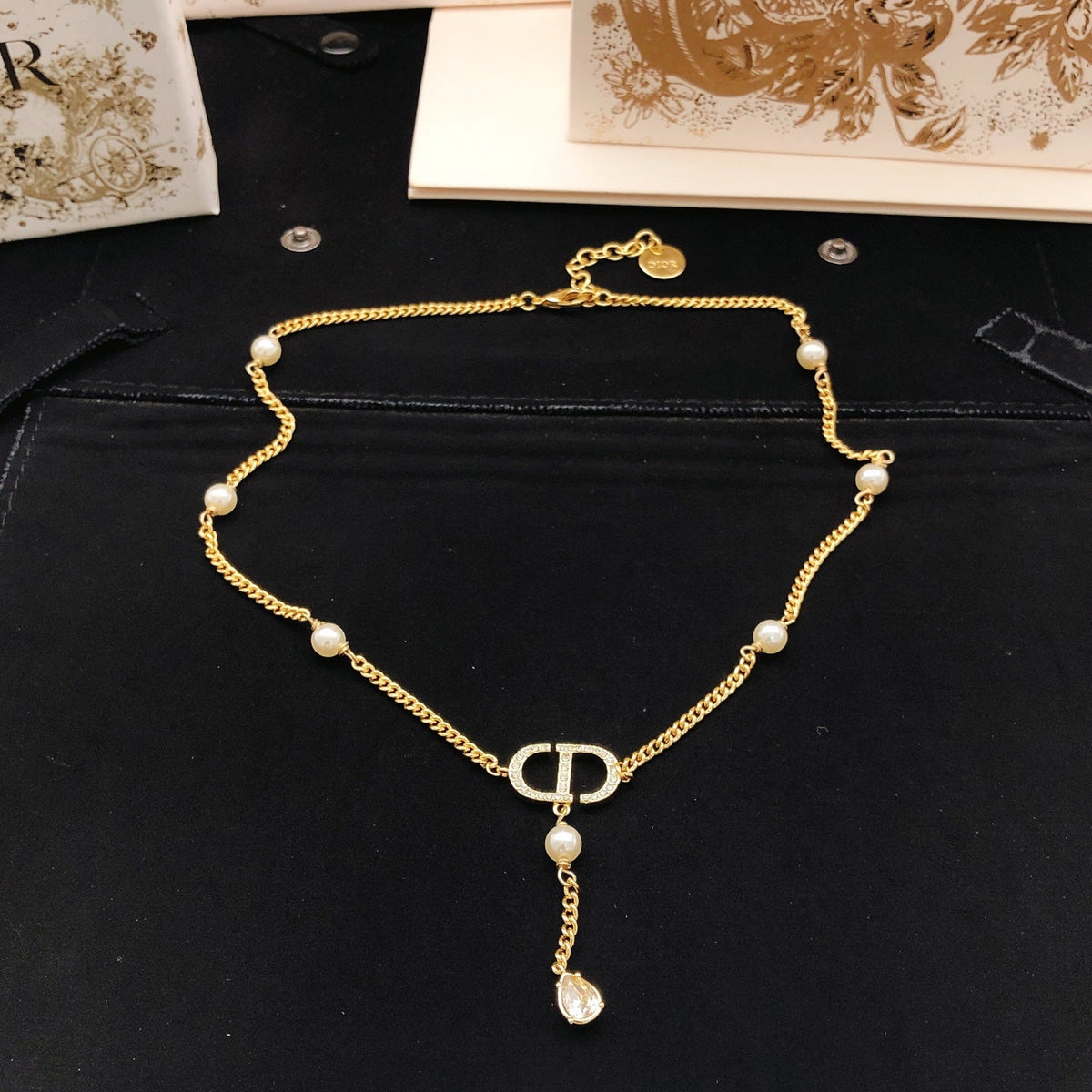 Martin Graham pendant necklace in polished metal-tone – detail view