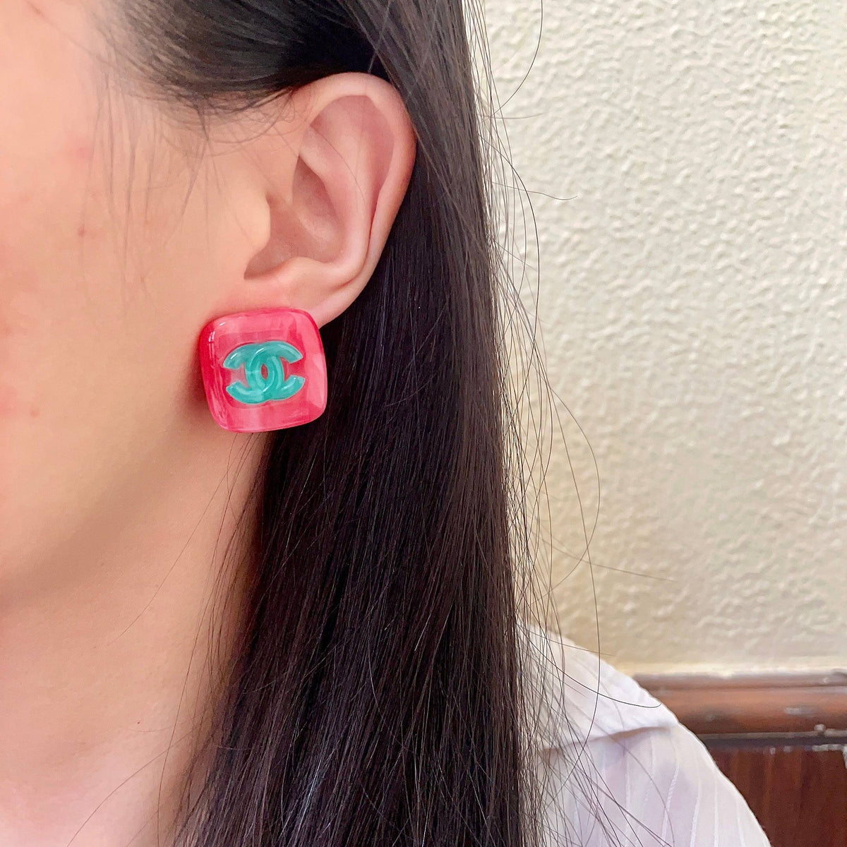 Martin Graham stud earrings in polished metal-tone – detail view