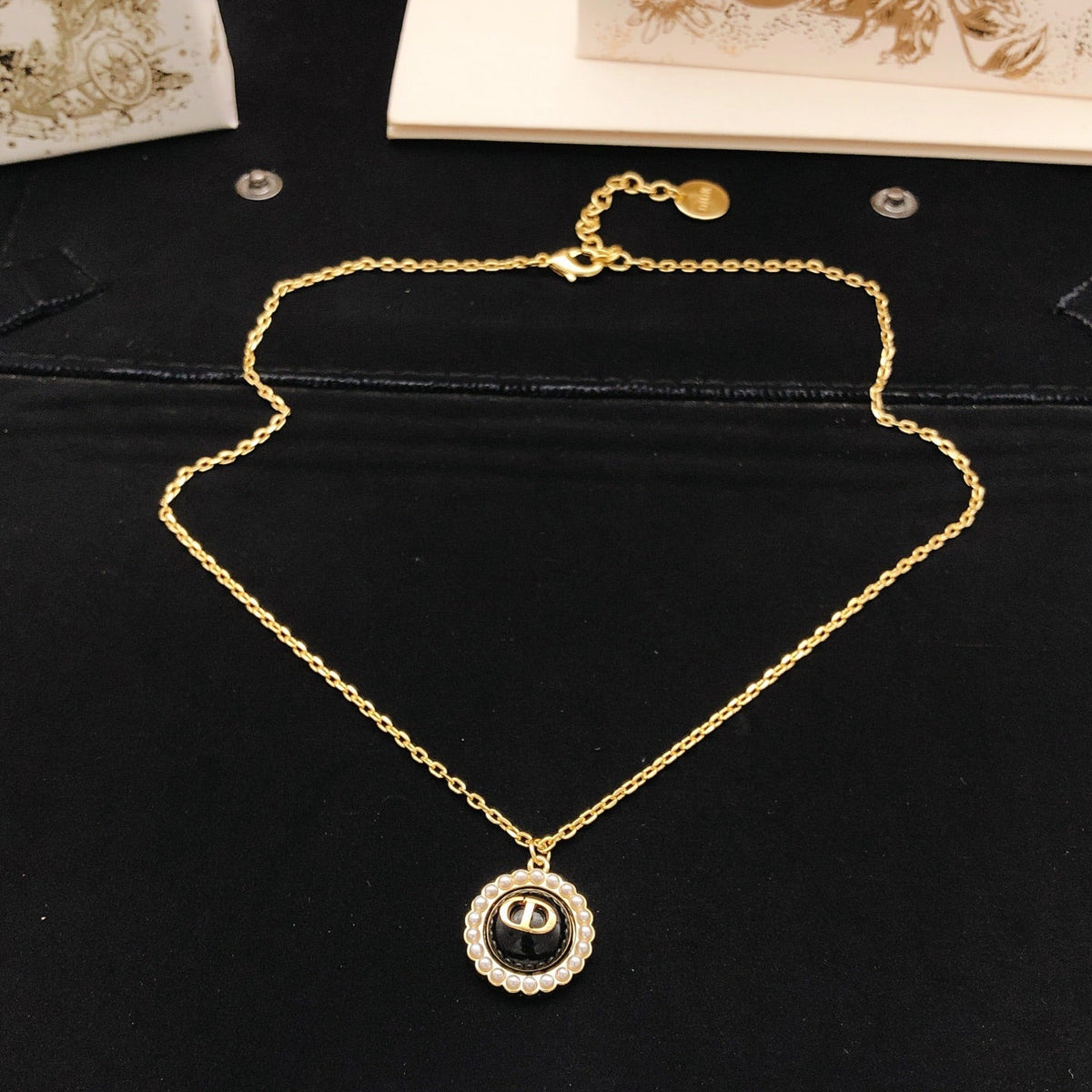 Martin Graham pendant necklace in polished metal-tone – detail view