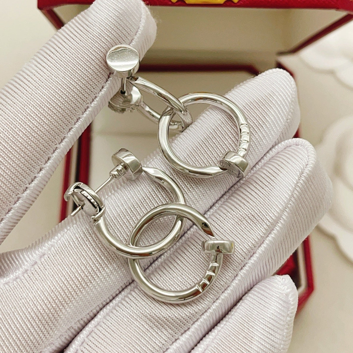 Martin Graham earrings in polished metal-tone – detail view