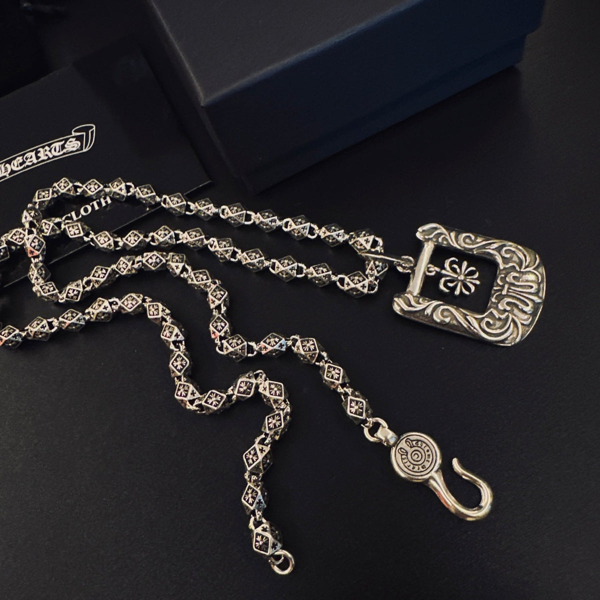 Martin Graham pendant necklace in polished metal-tone – detail view