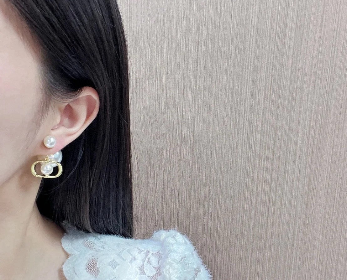 Martin Graham earrings in polished metal-tone – detail view