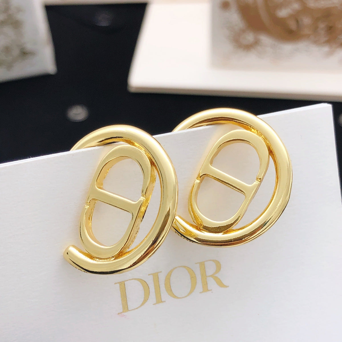 Martin Graham earrings in polished metal-tone – detail view
