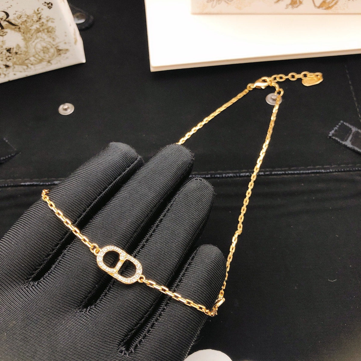 Martin Graham pendant necklace in polished metal-tone – detail view