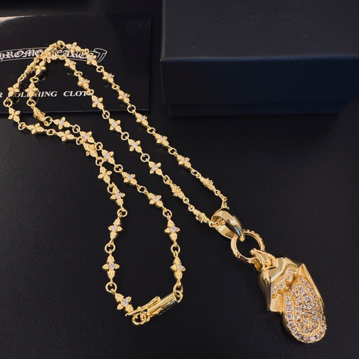 Martin Graham pendant necklace in polished metal-tone – detail view