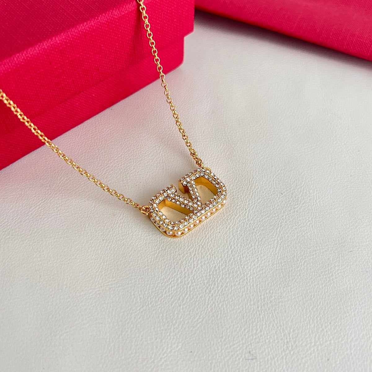 Martin Graham pendant necklace in polished metal-tone – detail view