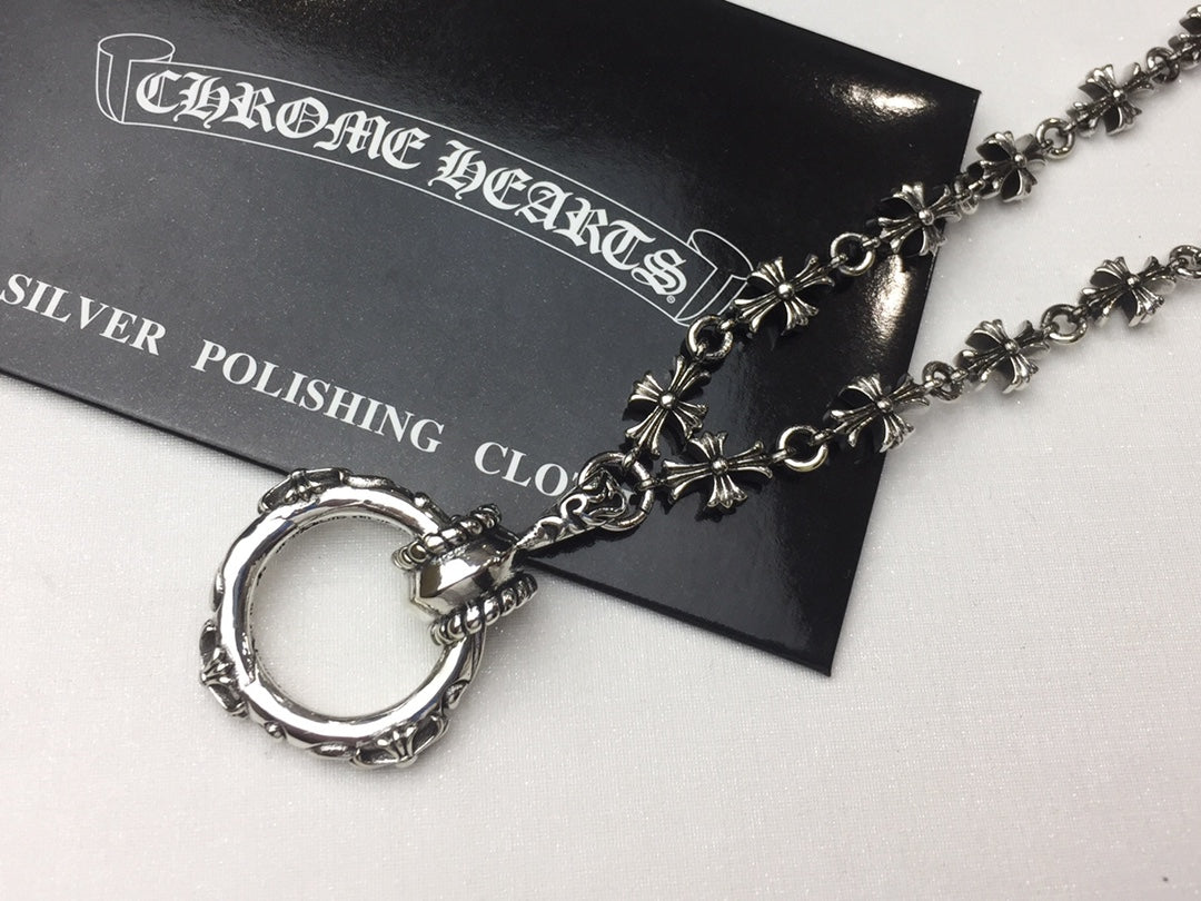 Martin Graham pendant necklace in polished metal-tone – detail view