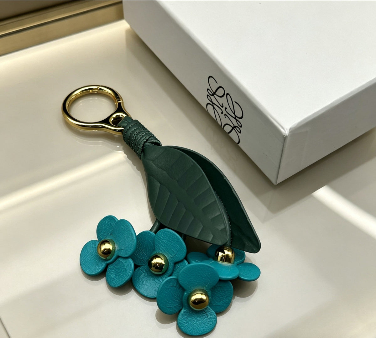 Martin Graham bag charm in polished metal-tone – detail view