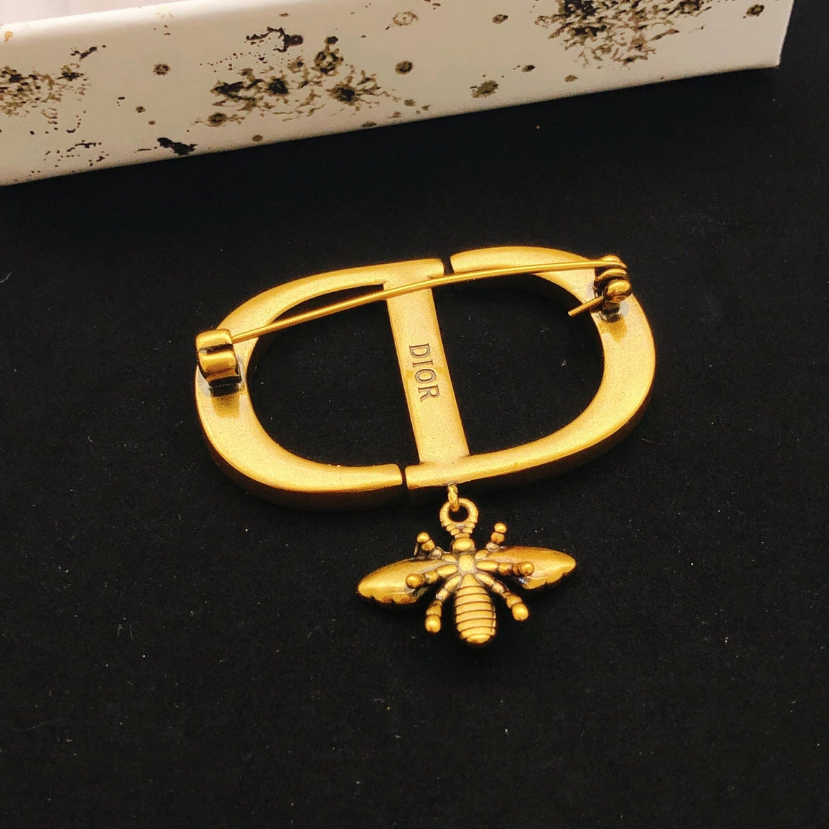 Martin Graham brooch in polished metal-tone – detail view