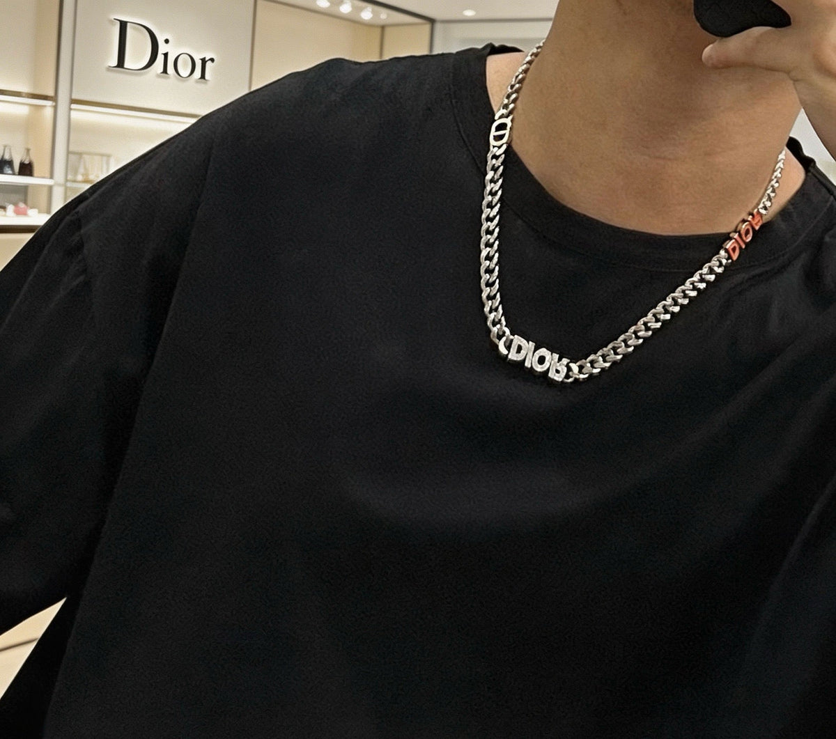 Martin Graham pendant necklace in polished metal-tone – detail view