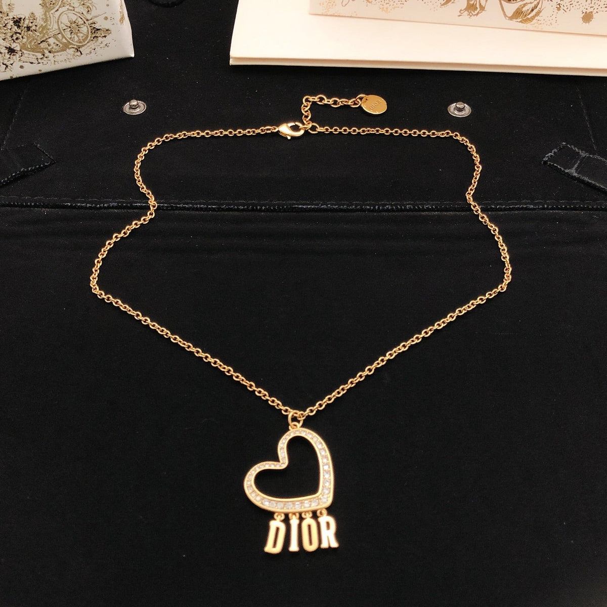 Martin Graham pendant necklace in polished metal-tone – detail view