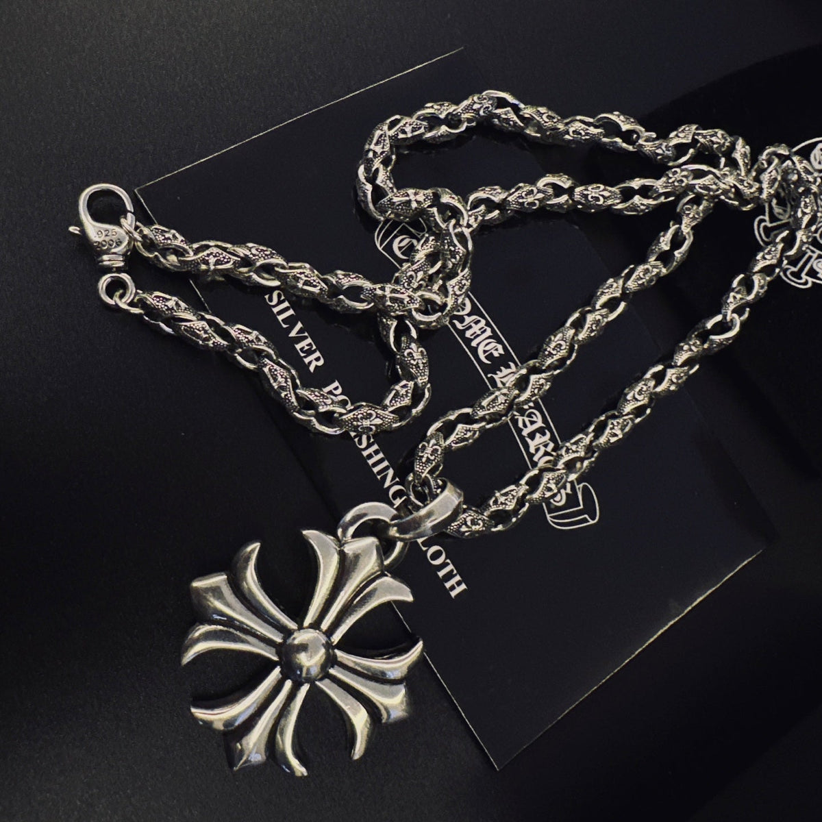 Martin Graham pendant necklace in polished metal-tone – detail view
