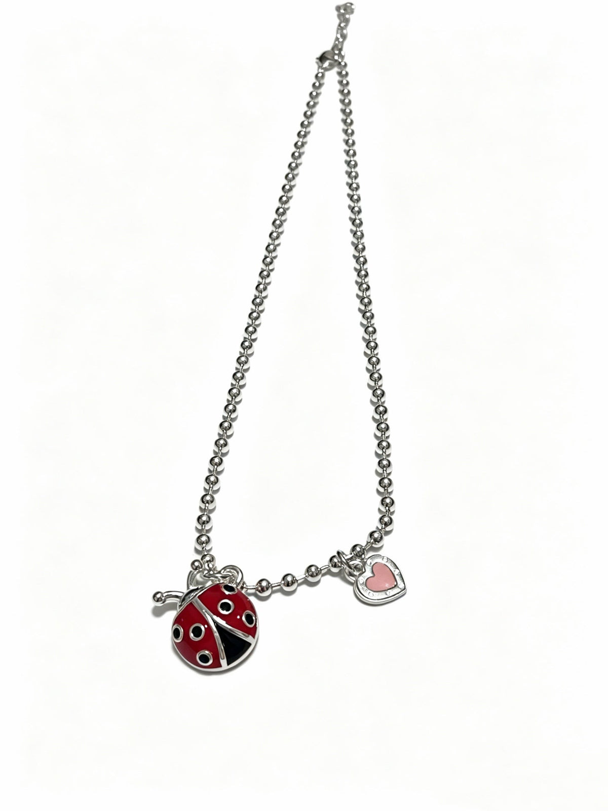 Martin Graham pendant necklace in polished metal-tone – detail view