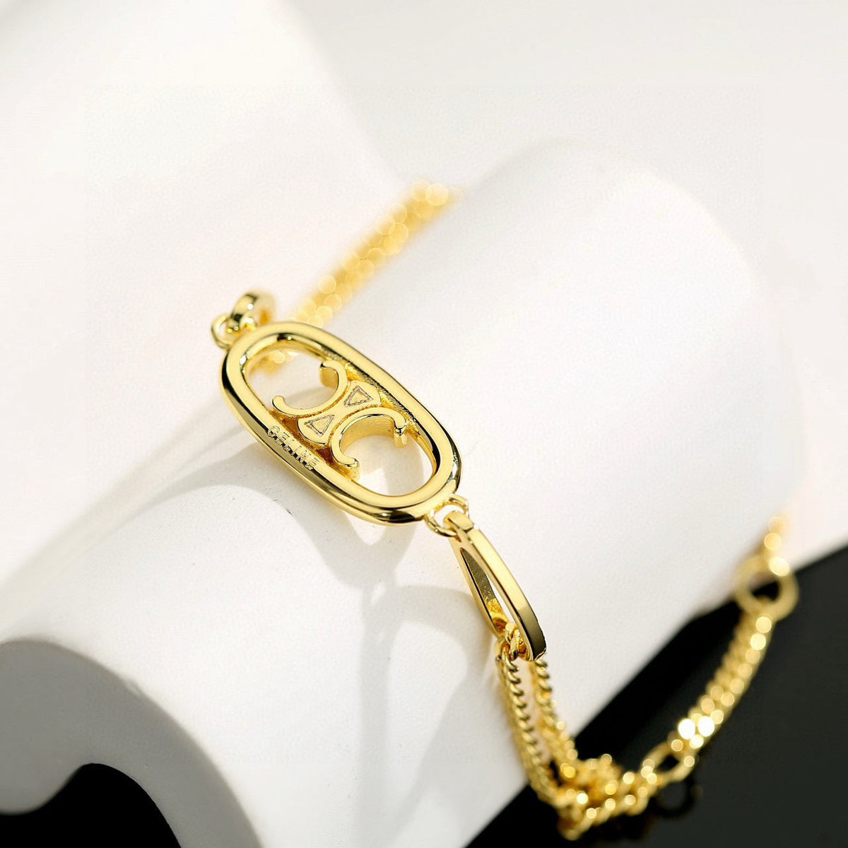 Martin Graham jewelry accessory in polished metal-tone – detail view