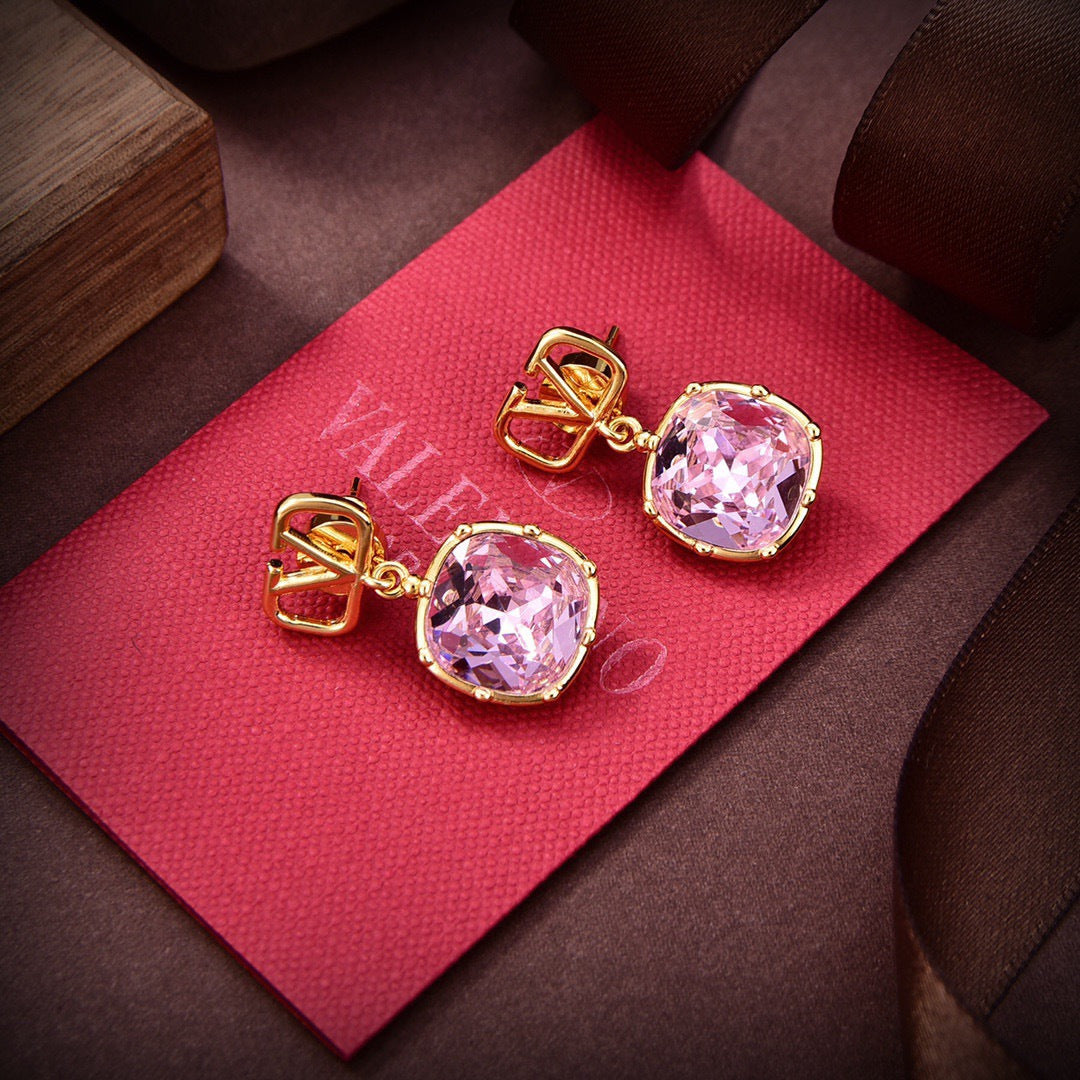 Martin Graham stud earrings in polished metal-tone – detail view
